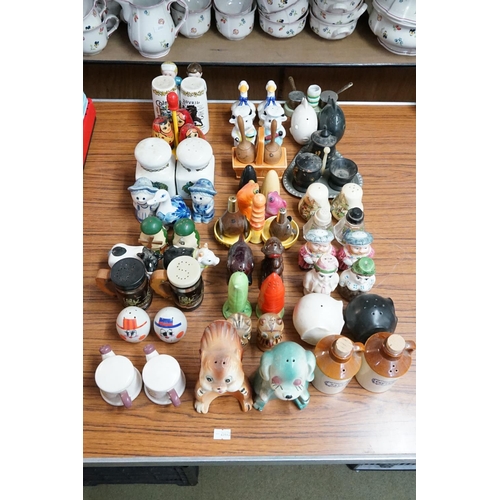 935 - A collection of cruet sets to include, elephants, fishes, ducks etc.