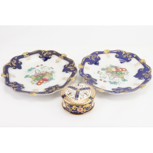 944 - A Staffordshire trinket pot, along with two decorative plates.