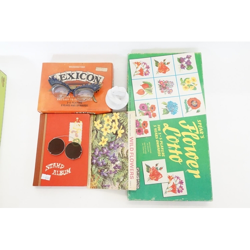 541 - A Box of Games to include Lexicon, Flower Lotto, a Stamp Album, Glasses, etc.