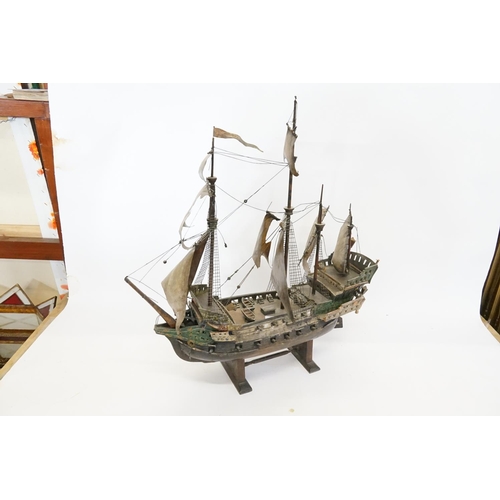 1030 - A Scratch Built Study of a Man o War Boat on Stand. Measuring: 51cms long x 57cms high. (AF).