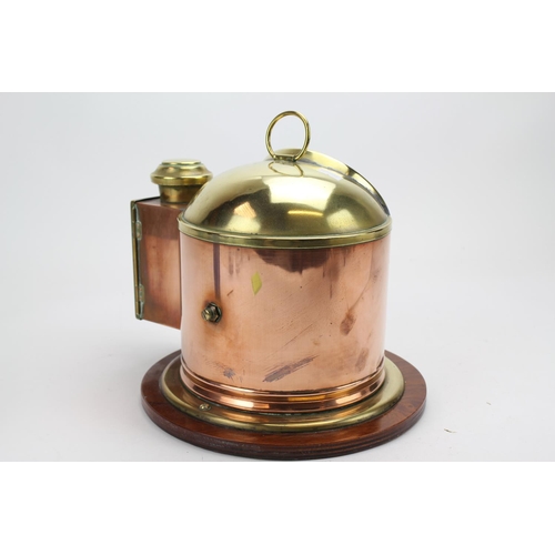 1037 - A Brass and Copper mounted binnacle Compass on a wooden stand.