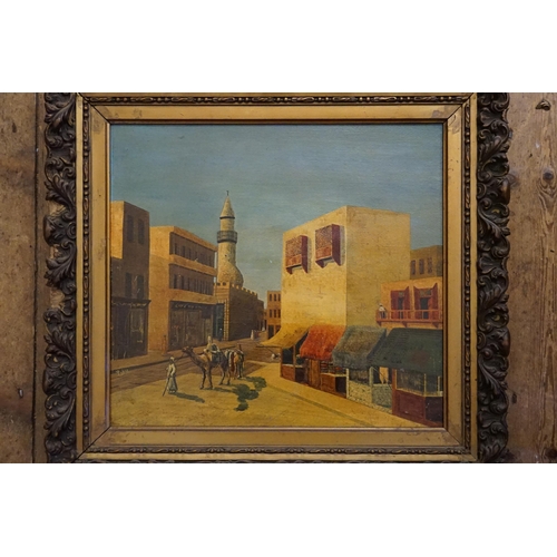 470 - An Oil on Board of a Moroccan Street Scene with Temple & Buildings, Framed. Measuring: 46cms x 40cms... 