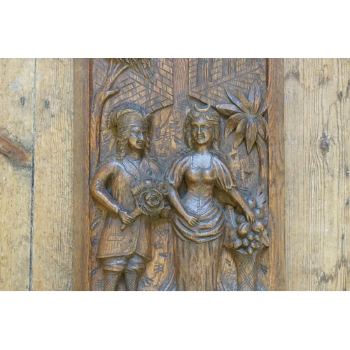 965 - A Late 19th Century French Carved Oak Panel depicting The Wedding Ceremony of a Young Couple.