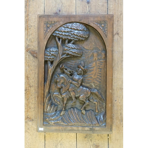 966 - A Late 19th Century Carved Chestnut Panel depicting a Trumpeter on a Horse.