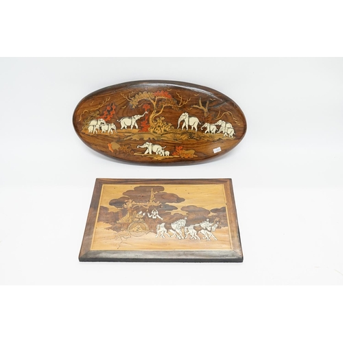 969 - A Carved & inlaid Pair of Wall Mounts depicting Elephants, Chariots, etc.