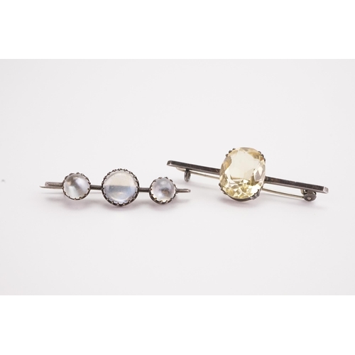 183 - A moonstone brooch, along with one other.