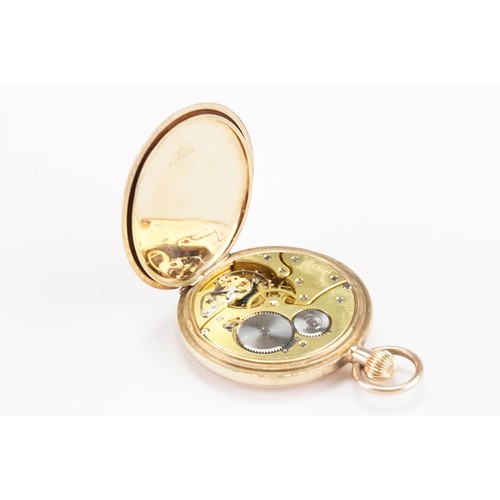 220A - A 9ct gold Zenith half hunter pocket watch, blue enamel decoration. Total weight 74.8g.