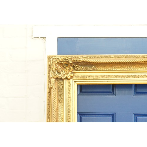 408 - A Very Large Ornate Gilt Picture Frame with Floral Garlands & Shell Decoration. 132cms x 184cms (App... 