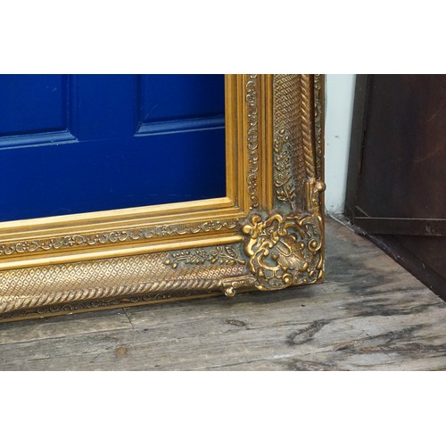 408 - A Very Large Ornate Gilt Picture Frame with Floral Garlands & Shell Decoration. 132cms x 184cms (App... 