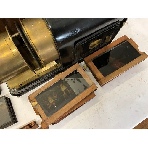 940 - A Victorian Magic Lantern with Brass Fittings in Original Metal Carrying Case along with a collectio... 