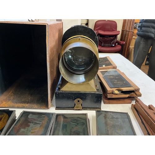 940 - A Victorian Magic Lantern with Brass Fittings in Original Metal Carrying Case along with a collectio... 