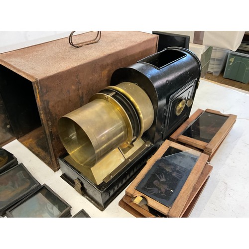 940 - A Victorian Magic Lantern with Brass Fittings in Original Metal Carrying Case along with a collectio... 