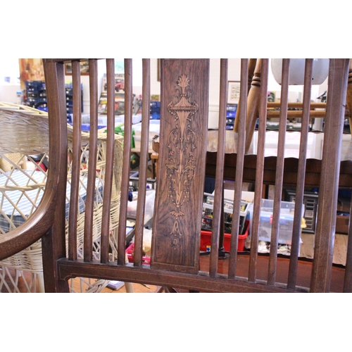 498 - A Sheraton designed satinwood inlaid Mahogany Drawing Room Settee resting on square legs. Measuring:... 