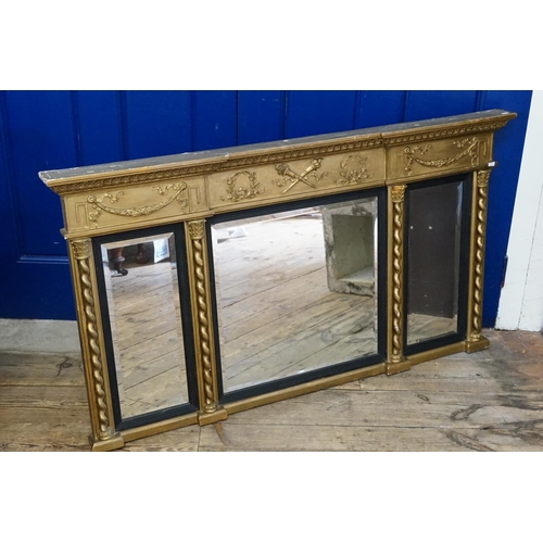 616 - A Georgian Gilt framed Three Panelled Bevelled Glass Over Mantle Mirror decorated with a frieze of T... 