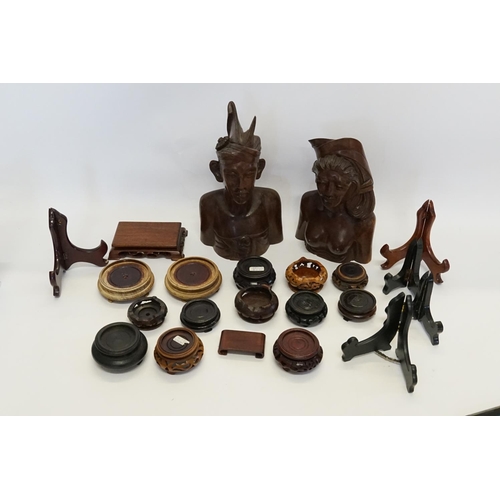 641 - A Collection of Chinese Stands for vases & Sculptures along with two Wooden Figures.