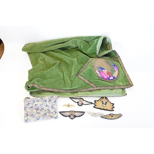 669 - A Collection of Badges to include RAF, Naval, etc, along with a Needlework Table Cover.