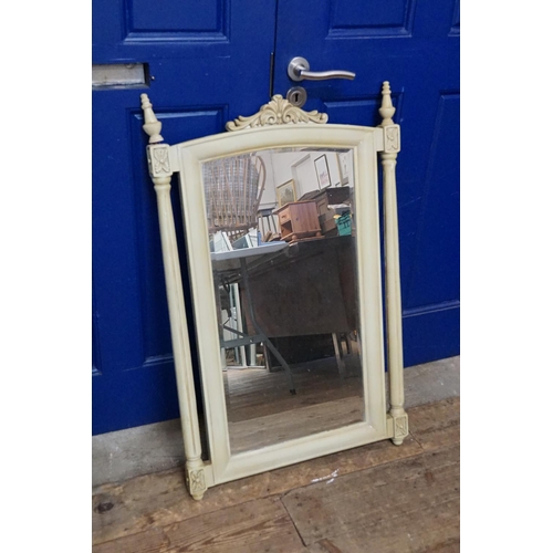 613 - A modern Looking Glass fitted with ribbed Columns & Sponge Back. Measuring: 63cms x 96cms.