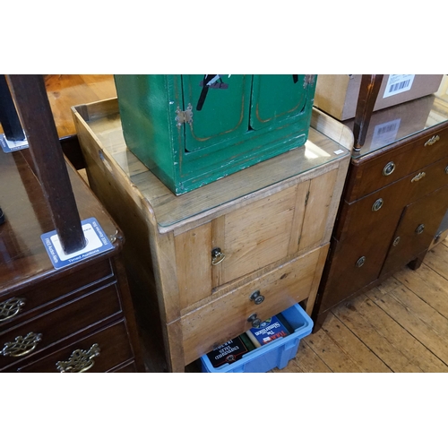 511 - A Ladies Pine Bedside Table fitted with a Single Door, Two Drawers & resting on square feet. Measuri... 