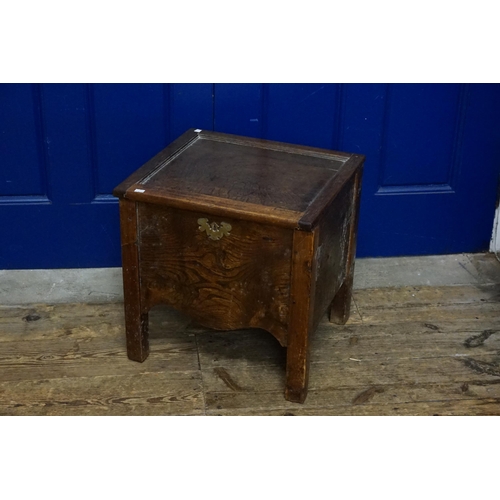 512 - A Oak Cased Commode with Liner. Measuring: 46cms x 42cms x 46cms High.