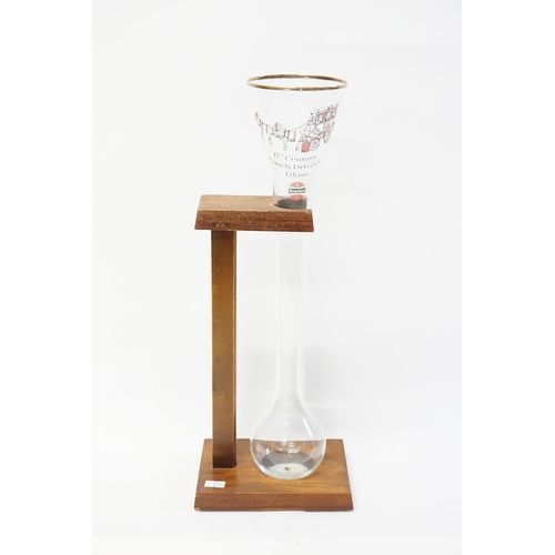 704 - An Ale Glass on wooden stand 