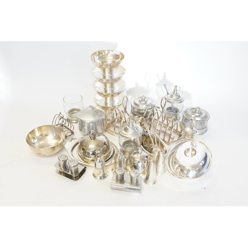 139 - A Collection of Silver Plated items to include Toast Racks, Butter Dishes, Sunday Dishes, etc.