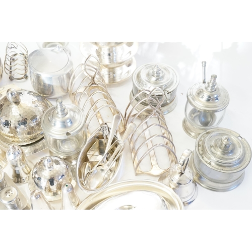 139 - A Collection of Silver Plated items to include Toast Racks, Butter Dishes, Sunday Dishes, etc.