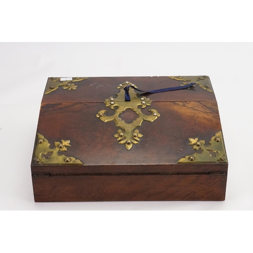 735 - A Victorian Walnut & Brass mounted Fold over Top Writing Slope with fitted interior & Key.