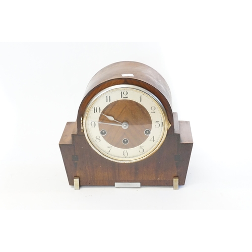 231 - A Walnut cased Bracket Clock with Westminster & Chime in an Art Deco Case.