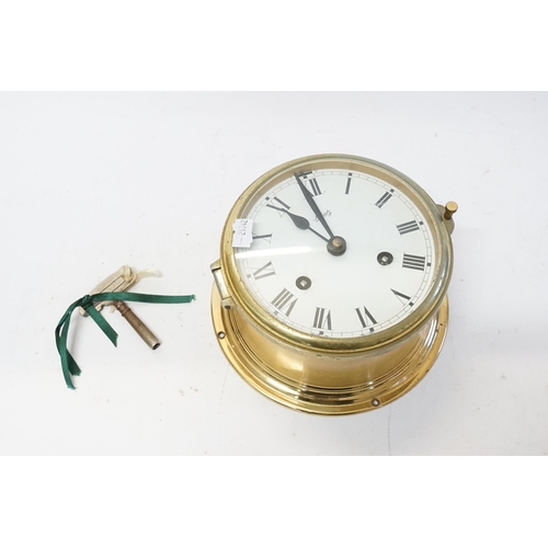 234 - A Brass Cased Ships Wall Clock by 