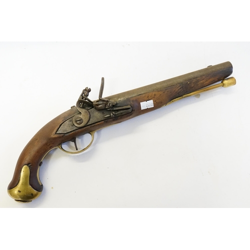 672 - An 18th Century Flintlock Pistol with Brass mounts & Ram Rod.