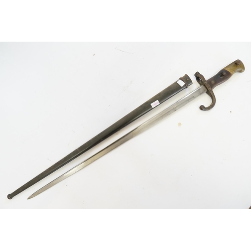 674 - A WWI Bayonet with Scabbard Brass mounted No: 86690.