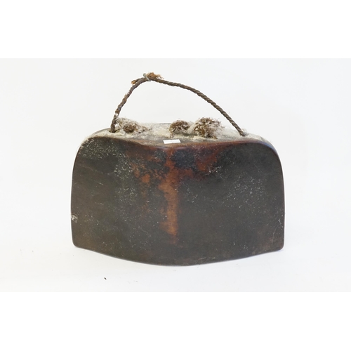 866 - An Antique Chestnut Cow Bell of Squat Oval Form.