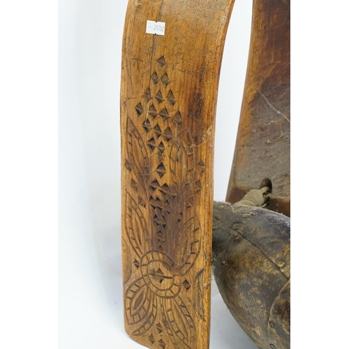 867 - An Antique Cow Bell with a carved Friesian Steamed Wood Collar with a coloured & patinated Bell.