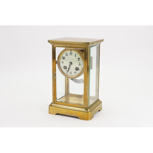 233 - A French Four Plate Mantle Clock with enamelled Dial, movement 5906. Maker 