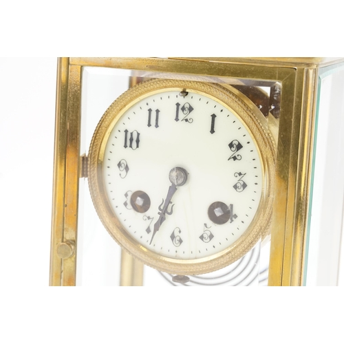 233 - A French Four Plate Mantle Clock with enamelled Dial, movement 5906. Maker 