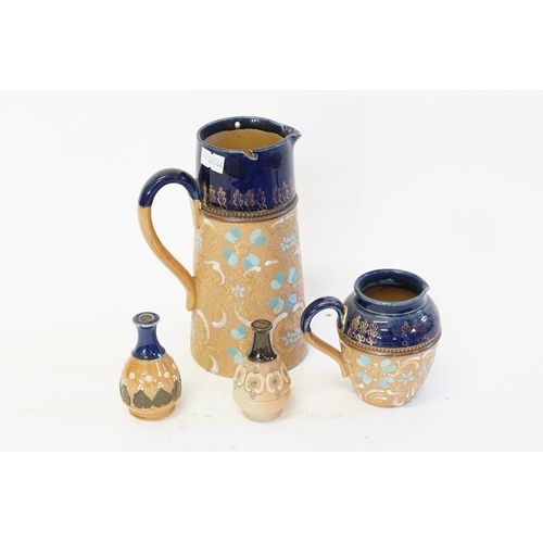 830 - Two Royal Doulton Tiny Vases & Two Jugs decorated with a Brown & Blue Border.