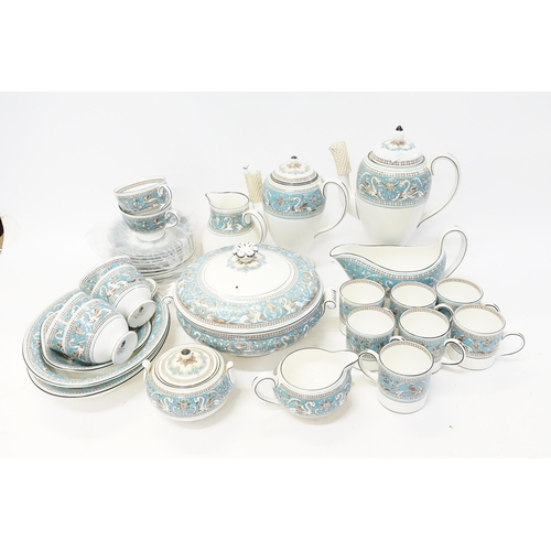 821 - A Collection of Wedgwood in the Florentine pattern No: W2714 to include Saucers, Coffee Pots, Cups, ... 