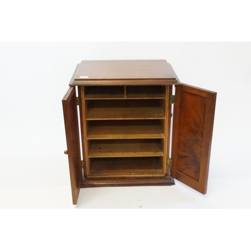 526 - A mahogany collectors cabinet with carrying handles.