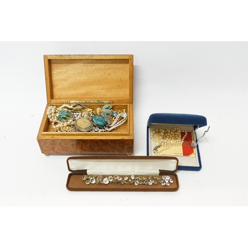 197 - An Inlaid Jewellery Box containing a selection of Costume Jewellery.