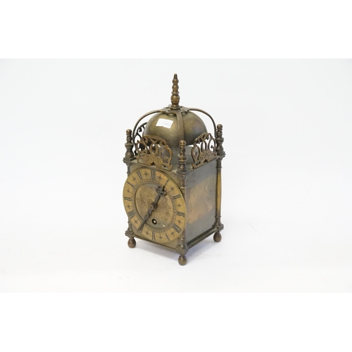 236 - A Modern Copy in Brass of a Lantern Clock with a English movement.