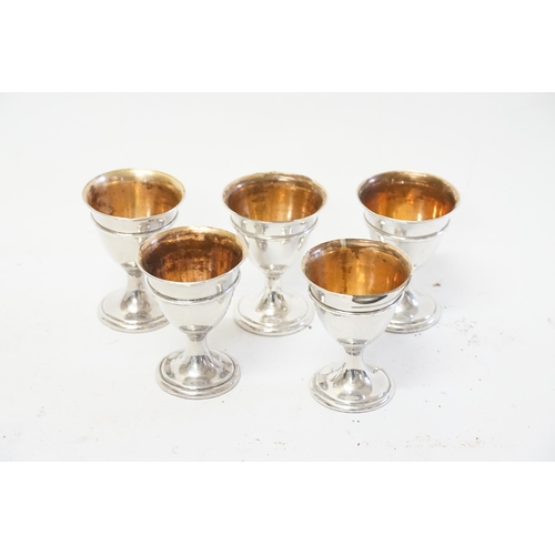 126 - A Set of Five Silver Plated Egg Cups.