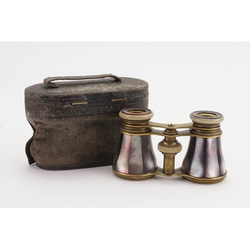 731 - A pair of mother of pearl opera glasses in case.