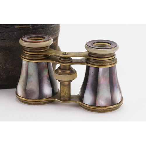 731 - A pair of mother of pearl opera glasses in case.