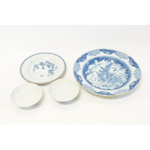 630 - A pair of blue and white Chinese style pin dishes, along with two blue and white plates.