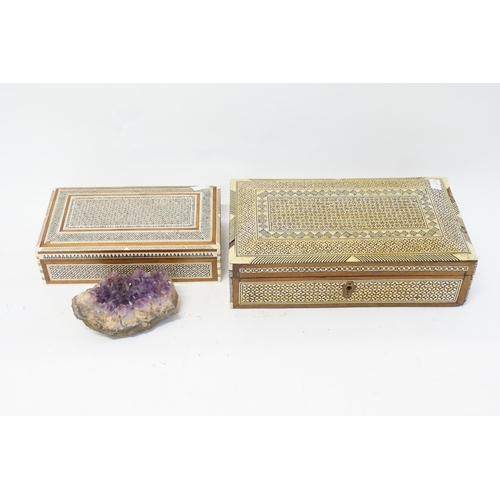 719 - Two middle Eastern inlaid boxes, along with a crystal.