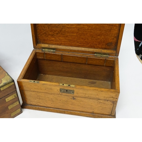 722 - A Victorian Walnut Veneered & Brass mounted Sloping Box & an Oak Stationary Box.