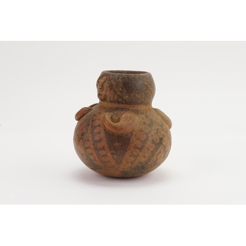 726 - A Aztec Ritual Funeral Container designed with a Face on a Bulbous Pot with short arms & black decor... 