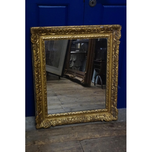 612 - A Gilt Framed Wall Mirror in a Gesso Frame. Measuring: 66cms x 74cms.