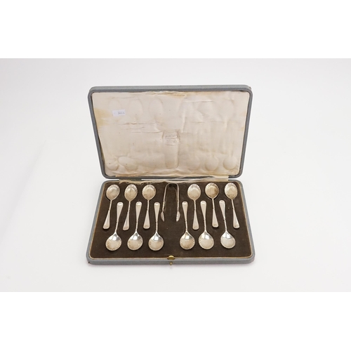 116 - A Set of 12 Silver Plated Shell Bowled Barley Twist Stemmed Tea Spoons in Case.