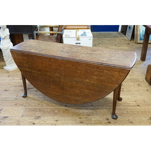 524 - A Georgian Mahogany Drop Flap Dining Table resting on Pad Feet. Measuring: 148cms across x 47cms (Cl... 